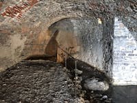 La sorgente sacra alla base della torre nolare dell'Abbazia di San Fruttuoso. La sorgente sacra alla base della torre nolare dell'Abbazia di San Fruttuoso.